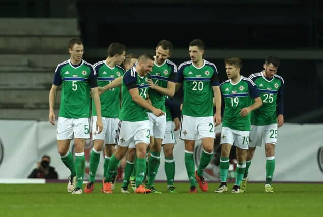 Northern Ireland's Conor Washington celebrates scoring against Slovenia. Picture by Matt Mackey