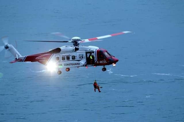 A woman is winched from Kenbane Head Ballycastle after falling on the headland and sustaining leg injuries.