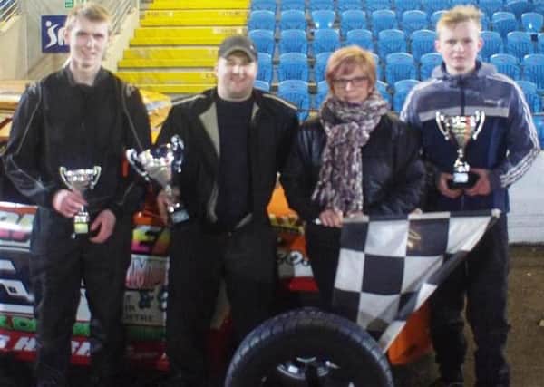 Stock Rod World Champion Michael Bethune collects the Yokohama title from Alison Elliott, along with runner-up Jack Kennedy (right) and Niall McFerran who finished third.