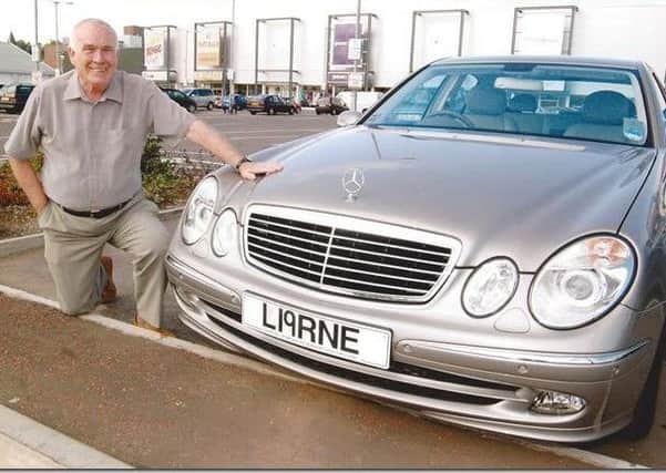 Charles Dempsey with the L19NE numberplate. INLT-11-7701-con