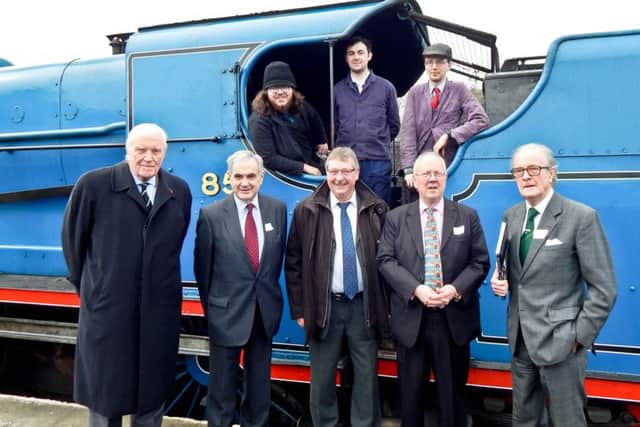 Pictured at the ceremony at RPSI Whitehead are Robert Guinness, RPSI vice-president; Denis Grimshaw, RPSI chairman; Sammy Wilson, MP for East Antrim; Lord Faulkner, President of the Heritage Railway Association, and Lord ONeill, RPSI President.  The locomotive crew are (from left) RPSI volunteers Ryan Downey, Matthew Crockett and  James Friel.  Picture by Alastair Maxwell  INCT 14-725-CON