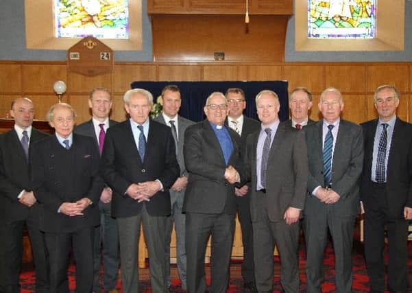 Keith Johnston, clerk of session of Tandragee Presbyterian Church, and fellow elders say farewell to the Rev George McClelland, who has retired as minister of the church after seven and a half years. Picture: Roy Vogan, Tandragee