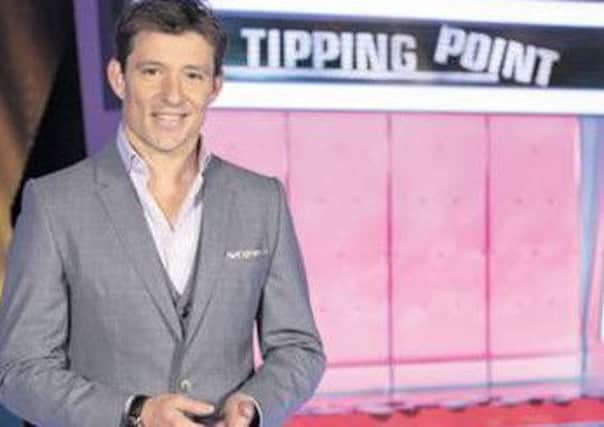 From RDF Television 

TIPPING POINT
ON ITV 

Pictured: Presenter BEN SHEPHARD

Presented by Ben Shepard.. Tipping Point ? is a show centred around an extraordinary machine filled with counters worth thousands of pounds.

A game of knowledge, skill and tactics; players must answer questions to win turns on the machine. Get a question wrong and the machine won't pay out, resulting in the player with the least amount of money at the end getting eliminated.

The last player standing goes head to head with the Tipping Point machine and they'll be focussed on just one counter ? the golden jackpot disc. Again, answering questions for the right to play the machine, they'll win a big cash sum if they can make it release the jackpot counter.

Â© RDF Television 

For further information please contact Peter Gray 
0207 157 3046 peter.gray@itv.com 

This photograph is (C) RDF and can only be reproduced for editorial purposes directly in connection with the programme or event mentioned above, or ITV plc. Once made availa