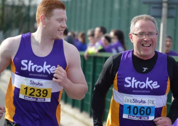 Eamonn Devlin and his son Diarmuid in action during the 10K run
