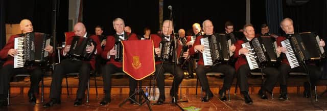 Baillies Mills Accordion Band with Aubrey Campbell, Musical Director (right) pictured playing a selection of Scottish tunes at the Leapoughs Pipe Band Scotch Night in Dromore High School on Friday 4th March.