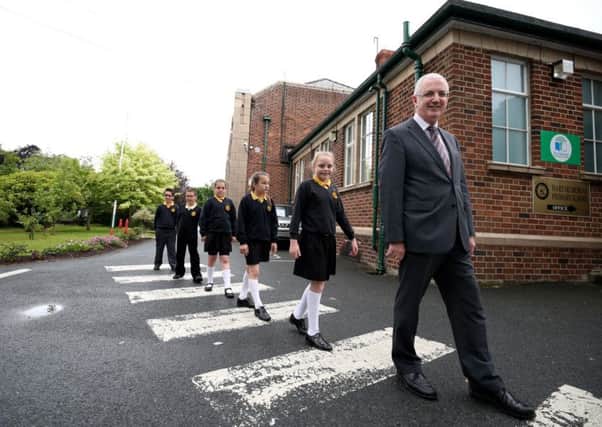 Hart Memorial Primary School Transport Minister Danny Kennedy announced the winners of the recent Travelwise NI My Walk to School competition.  Fifteen schools from across Northern Ireland were named as the winners in the sustainable transport initiative which took place during Walk to School Week 2015. Schools in Northern Ireland registered to take part in Walk to School Week and all primary schools were asked to encourage pupils, parents and teachers to get active and to take part in a competition to be in with the chance of winning high Viz vests for all pupils in the school.