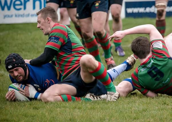 Andrew Barron crashing over for Lisburn's first try of the game.