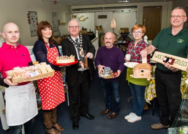 Larne pop up shop occupants Aidan and Patrice Reilly of Makey Bakey Heart, Mayor Billy Ashe, John Armstrong and Ellie McAuley of CafÃ© Riva Deli and Malcolm Brown of The Wee Wooden Company. INLT-14-700-con