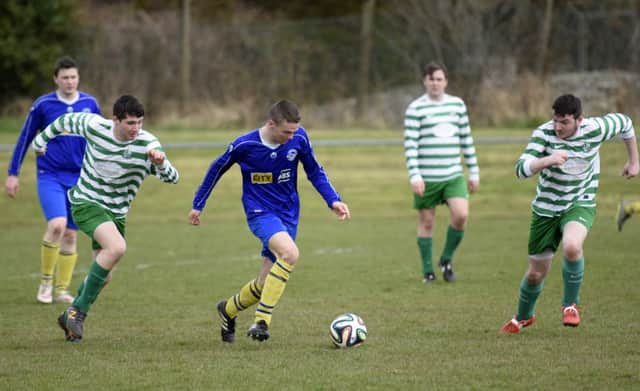 Alan Blair pictured on the ball for Churchill United during Saturday's match against Draperstown. INLS1416-113KM