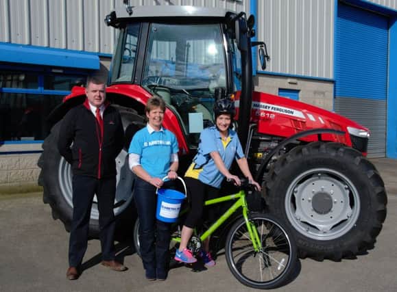 Sean Mc Avoy, Massey Ferguson Field Support Specialist, Roberta McCullough from Diabetes UK Northern Ireland and YFCU President Roberta Simmons are pictured announcing the 86 miles for 86 years charity cycle. INBM15-16S