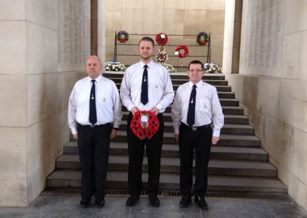 Pictured (l-r) laying a wreath at the Menin Gate are David Hunter, Glenn Hinchey and Dennis Murray. INNT 14-505CON