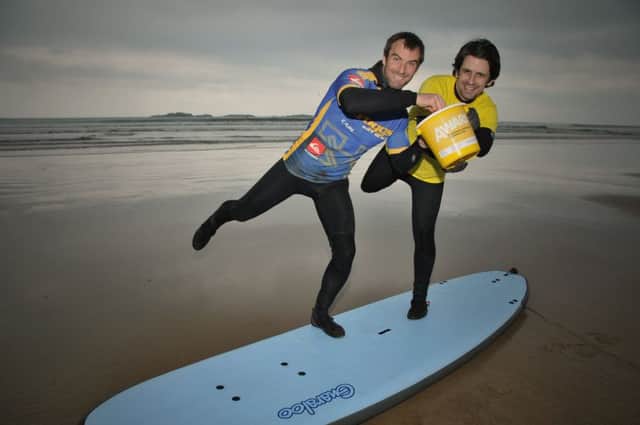 Tandem Surf Competition organiser Carl Russell and Kieran Hughes | Fundraising Officer for AWARE NI. PIC: Jude Gordon/www.medusamedia.net