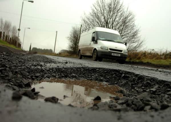The massive pot-hole on the main Drummullan to Moneymore Road. Picture: SIMON ROBINSON.