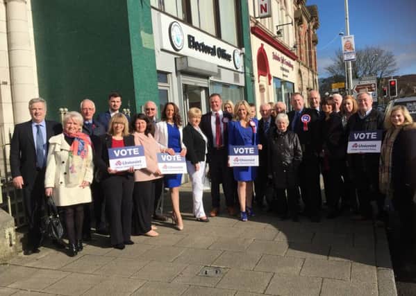 Ulster Unionist candidates Joanne Dobson, Doug Beattie MC and Kyle Savage with some of their supporters