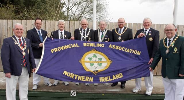 HIGH FLYERS. Tommy Smyth, President of the N.Ireland Provincial Bowling Association, pictured along with Deputy Mayor Cllr Darryl Wilson and fellow dignitaries at the raising of the PBA Flag at Ballymoney Bowling Green on Saturday.INBM14-16 019SC.