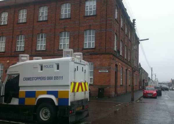 A 31-year-old woman was found dead in an apartment block in Lurgan's Vi ctoria Street