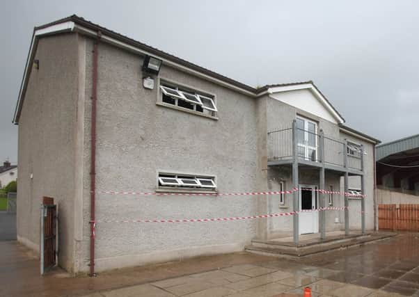 Police tape at Moy GAA club in September 2015 after the club was damaged in an arson attack