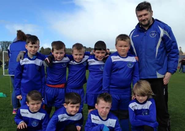 Northend U8s with team manager Gordon Patterson at the Larne Sevens tournament on Easter Monday.