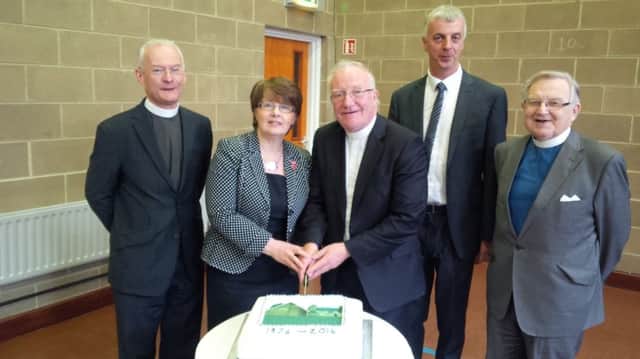 Pictured at the event are (Left to Right) are Rev. Joseph Andrews, Minister of Ballee Presbyterian Church, Anne McNie and her husband, Dr. Ian McNie, Moderator of the Presbyterian Church in Ireland, John Quigley, Ballee Clerk of Session and Rev. John McCullough who was Ballees minister from 1977-1986.