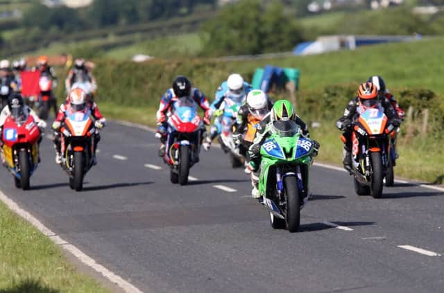 Derek McGee leads the Supertwins pack at the Armoy road races. INBM15-16S