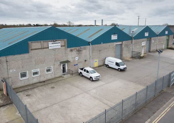 Dennison Bodyshop has doubled in size from 18,000 to 36,000 sq/ft. INNT 14-515CON