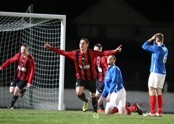 Alan Rainey celebrates after socring his and Harryville Homers' second goal in tonight's Irish Junior Cup semi-final against Carniny Rangers. Picture: John McIlwaine.