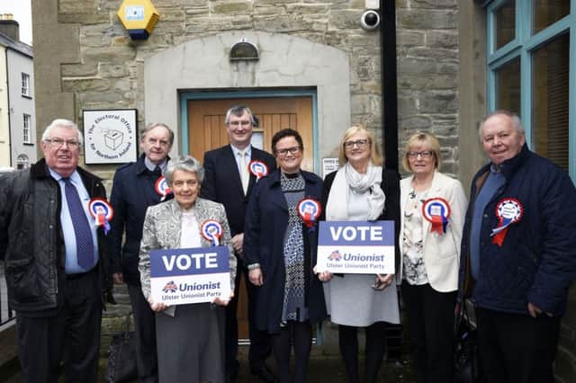 Ulster Unionist Party candidate for Foyle, Julia Kee, fourth from right, pictured with party members, from left, Jack Allen, Noel Moore, Alderman Mary Hamilton, Tom Elliott MLA, Rae Kee, Heather White and William Lamrock, after handing over her nomination papers at The Electoral Office on Monday morning. INLS1416-120KM