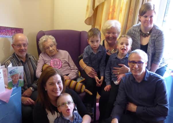Centenarian Norah Wright with her son Maurice (left), daughter-in-law Yvonne (second right), granddaughters Lynda (right) and Alison (front), Alison's husband Andrew and their sons Ben, Jack and Thomas.