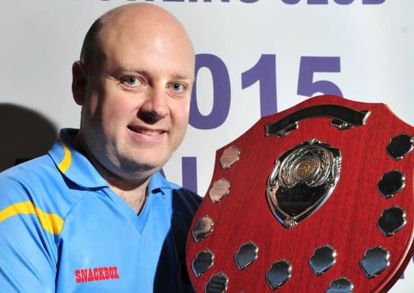 A smiling Cookstown Parochial Bowling Club captain Damien McElroy with the Galway Bay Hotel sponsored IIBA Club Championship Shield.INMM0215-352