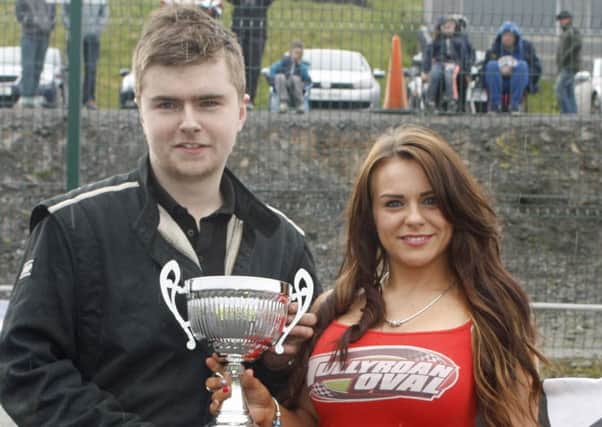 Portadown's Stuart Cochrane and Hayley Bevan from Tullyroan Oval at the Cherry Pipes-sponsored weekend meeting. Pic by Brian Lammey.