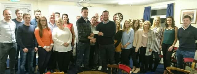Moneyslane FC hosted a strictly after party and presented a cheque for Â£1,500 to Emily Morrison Fund.