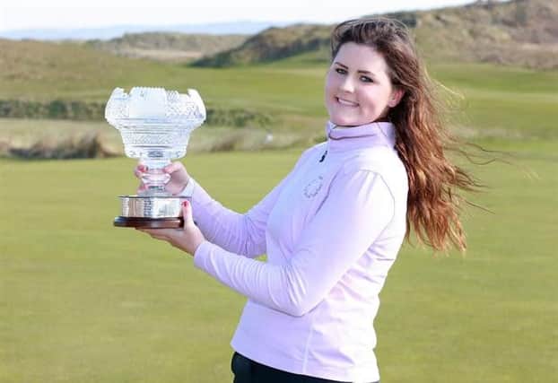 Olivia Mehaffey shows off the trophy after easing to victory at the Irish Womens Open Stroke Play Championship. Photo courtesy of Ronan Lang / ILGU.