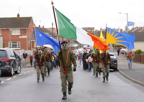 Picture - Kevin Scott / Presseye

Belfast , UK - March 26, Pictured is the Republican Sinn Fein commemorative march as it makes its way from the Kilwilkee Estate to St Colemans Cemetary on March 26, 2016  Belfast, Northern Ireland ( Photo by Kevin Scott / Presseye )