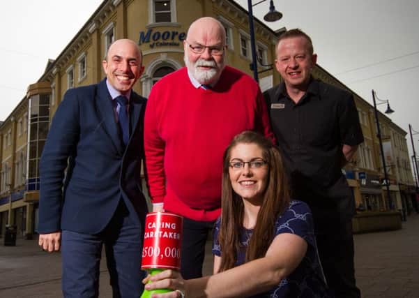 Simon Colquhoun, store director of Moores of Coleraine, David Boyle MBE with staff members Merryl Ewart, Castlerock and Lisa Moore, Limavady pictured at Moores of Coleraine, getting ready to fundraise for the Caring Caretaker. INCR16