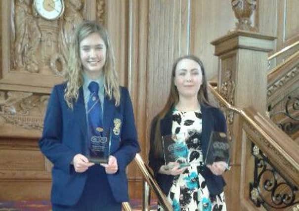 Loreto College students Maggie McBride and Emily Moore, who were presented with First Place accolades in GCSE subjects. INCR16-115