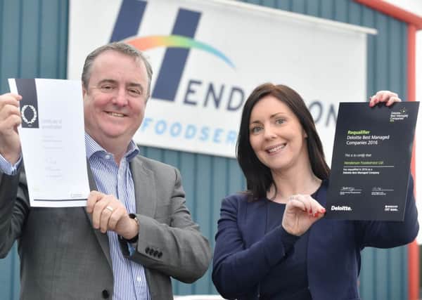 Damien Barrett, Managing Director and Kiera Campbell, Sales Director at Henderson Foodservice celebrate the company's double awards success. INNT 15-804CON