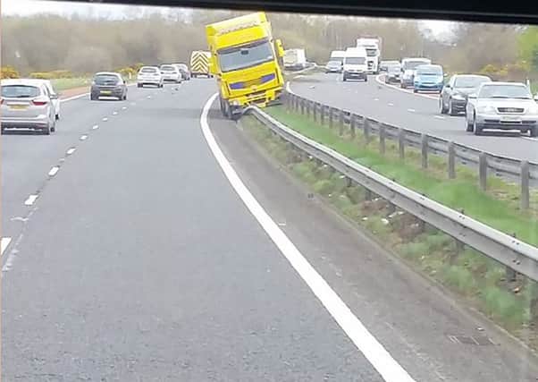 A lorry crash on the M1 is causing serious delays for motorists.
The vehicle hit the central reservation between junction eight at Blaris and junction nine at Moira at about 11:45 BST on Friday