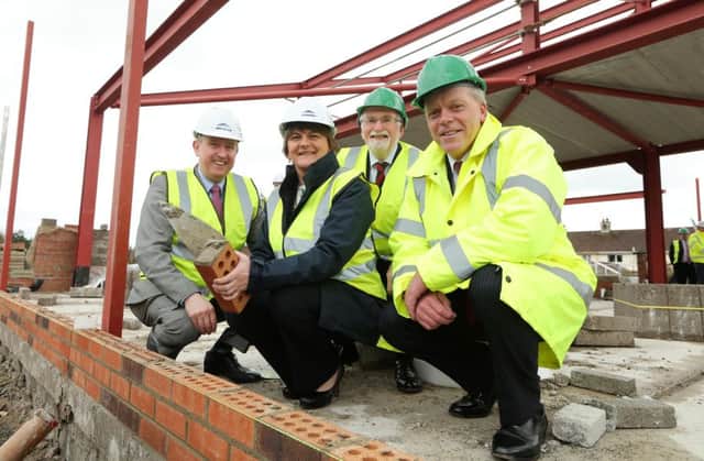 First Minister Arlene Foster is pictured at a Ground Breaking Ceremony at Dalriada School in Ballymoney. 

The First Minister is pictured with Finance Minister Mervyn Storey, Brian Dillon, Chairman of the Board of Governors and Tom Skelton, Headmaster. INBM16-16S