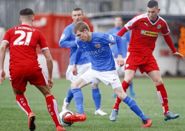 Rhys Marshall in action during the game at Solitude.