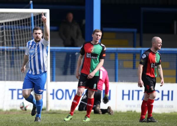Coleraine's James McLaughlin celebrates after scoring in the third minute against Glentoran in the 1-1 draw
