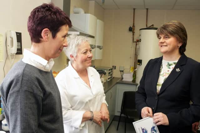WOMEN'S OWN. First Minister Arlene Foster chats to Assumpta McGonigle, Head of Home Economics and Classroom Assistant, Ann Lamont on Friday.INBM15-16 003SC.
