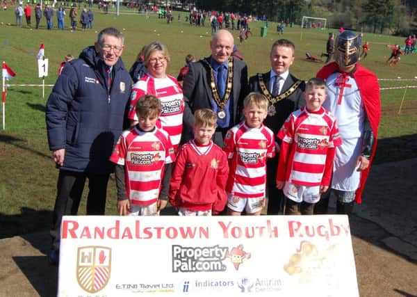 Mayor of Antrim and Newtownabbey, Councillor Thomas Hogg, along with other guests and some of the children who played in the Randalstown RFC mini festival on Saturday.