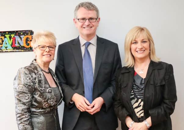 Pat Hutchinson (left) with Pol Callaghan, Chief Executive of Citizens Advice NI, and Melanie Humphrey, Chair of Citizens Advice Newtownabbey. INNT 14-512-SO