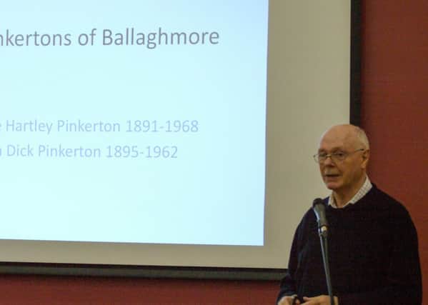 John Pinkerton with presentation sheets. inbm17-16s