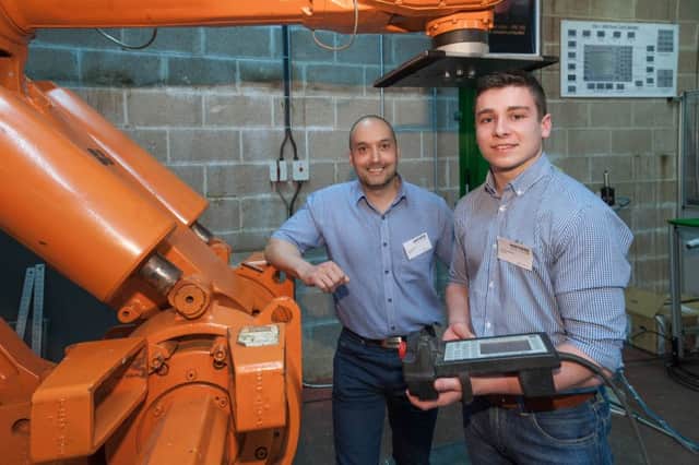 Pictured are Andrew Millar from Michelin, who spoke to delegates about the benefit of employing a Higher Level Apprentice, and Thomas Haveron (HLA Apprentice) who also shared his experience of the programme.