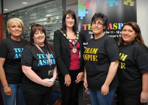 Mid-Ulster District Council Chairperson Linda Dillon with the organising committee during the Team Aspie gala concert held in the Burnavon.INMM1516-381