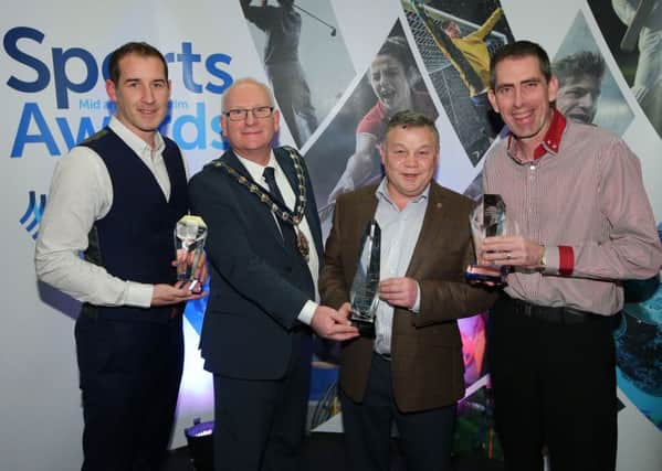 Mayor of  Mid and East Antrim Borough Council Billy Ashe presents former boxer Roy Webb with the the Hall of Fame award at the Larne Sports Awards organised by Mid and East Antrim Borough Council in Larne Leisure Centre. Also pictured is Gary Haveron, left, from Carrick Rangers FC with the Manager of the Year award and Bobler Martin McHugh, right, with the Sportsperson of the Year award.