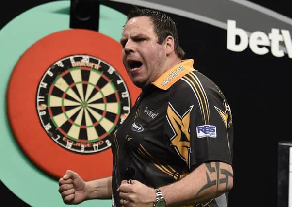 14/4/16: Adrian Lewis celebrates after beating James Wade during the Betway Premier League Darts match at the SSE Arena, Belfast.
