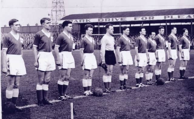 NORTHERN IRELAND'S TEAM LINE UP BEFORE THE MATCH AGAINST ITALY AT WINDSOR PARK ON JANUARY 15TH 1958 WHICH THEY WON 2-1 WITH GOALS FROM WILBUR  CUSH AND JIMMY MCILROY TO QUALIFY FOR THE WORLD CUP FINALS IN SWEDEN LATER THAT YEAR.
L/R DANNY BLANCHFLOWER, WILLIE CINNINGHAM,JACKIE BLANCHFLOWER, BILLY BINGHAM, NORMAN UPRICHARD, JIMMY MCILROY, BERTIE PEACOCK, WILBUR CUSH, BILLY SIMPSON, PETER MCPARLAND AND ALFIE MCMICHAEL