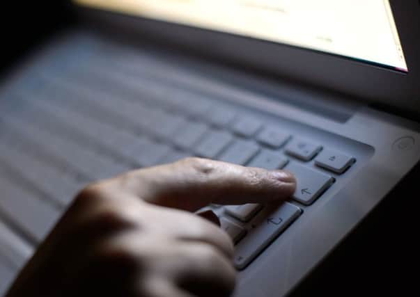 File photo dated 06/08/13 of a person pressing the delete button on a laptop, as Financial fraud losses surged by 26% year-on-year in 2015 amid a growing threat from deception scams and cyber attacks, a report by inancial Fraud Action UK (FFA UK) has found. PRESS ASSOCIATION Photo. Issue date: Thursday March 17, 2016. Some Â£755 million-worth of losses were recorded in 2015 across payment cards, remote banking such as internet and mobile phone banking, and cheques. See PA story MONEY Fraud. Photo credit should read: Dominic Lipinski/PA Wire